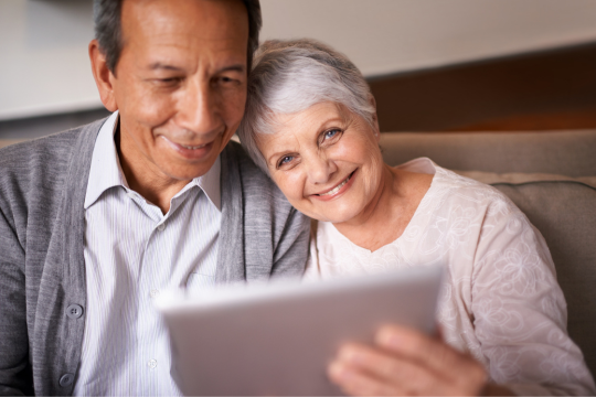 Smiling adult couple.